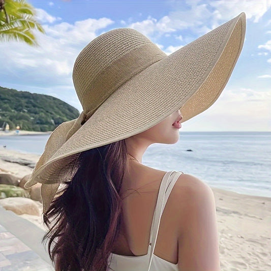 A Women'S Summer Straw Hat Designed for Outdoor Use, Featuring a Wide Beach Strap. It'S Foldable, Lightweight, And Easy to Carry, Making It Perfect for Holidays And Outdoor Events, As Well As a Stylish Accessory